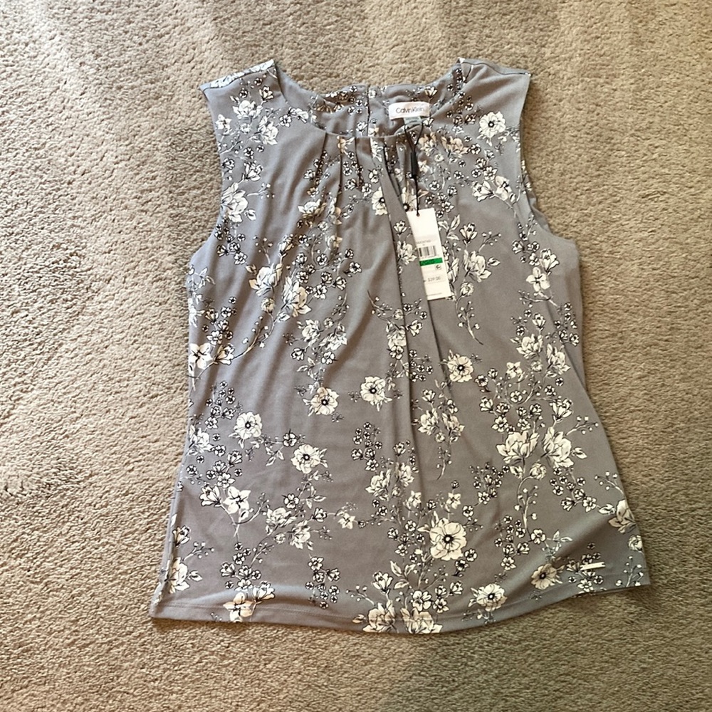 Calvin Klein size L gray with white flour top